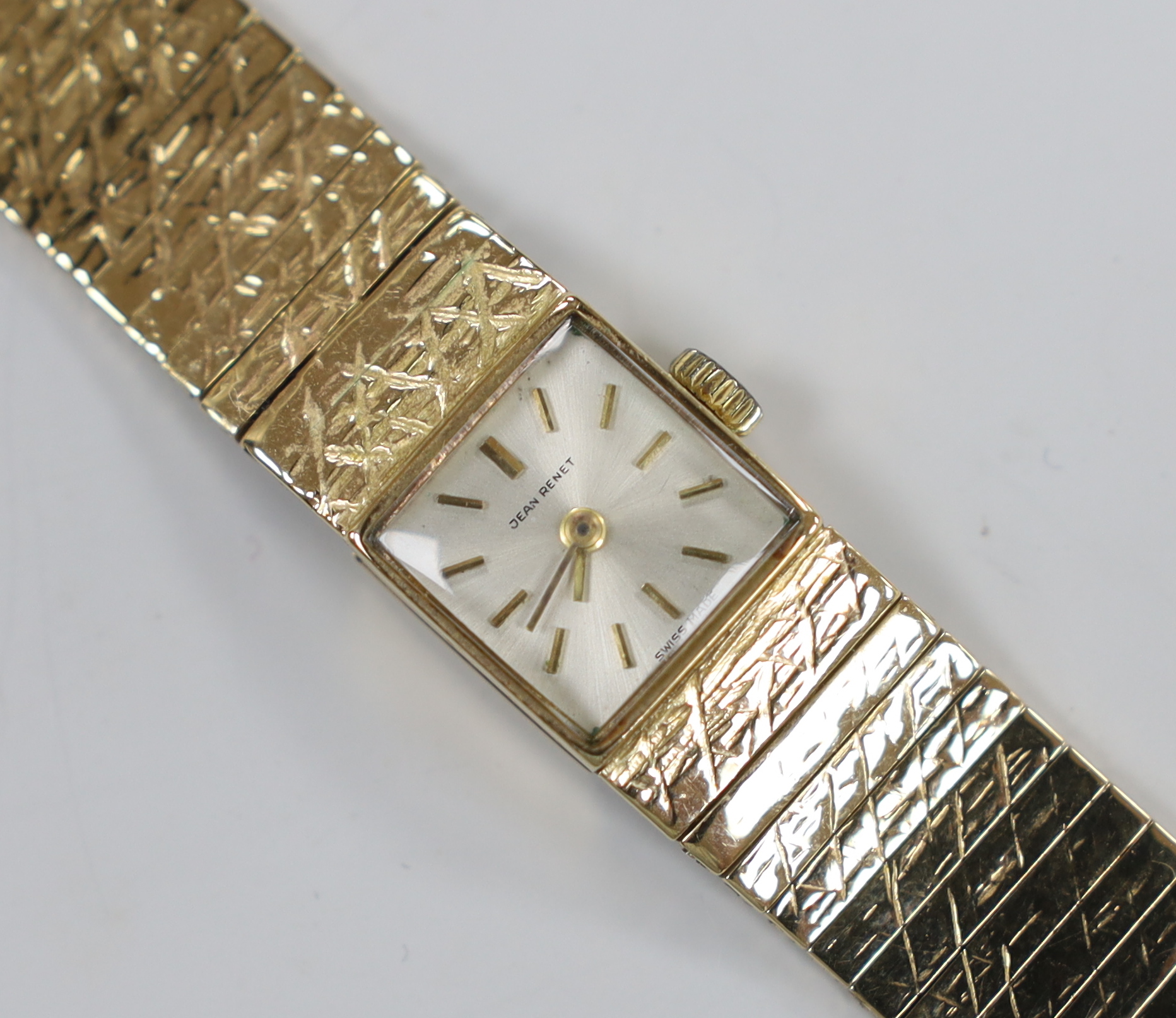 A lady's 1960's 9ct gold Jean Renet manual wind bracelet watch, overall 17.6cm, gross weight 33.6 grams.